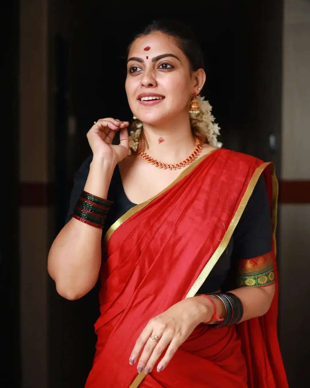 Indian Actress Anusree Nair in Red Color Saree Blouse